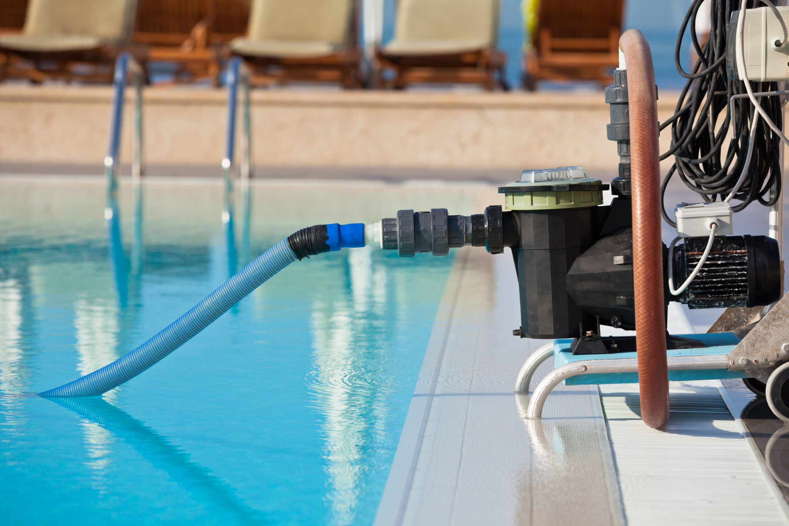 Cleaning pump working with a swimming pool. Horizontal shot