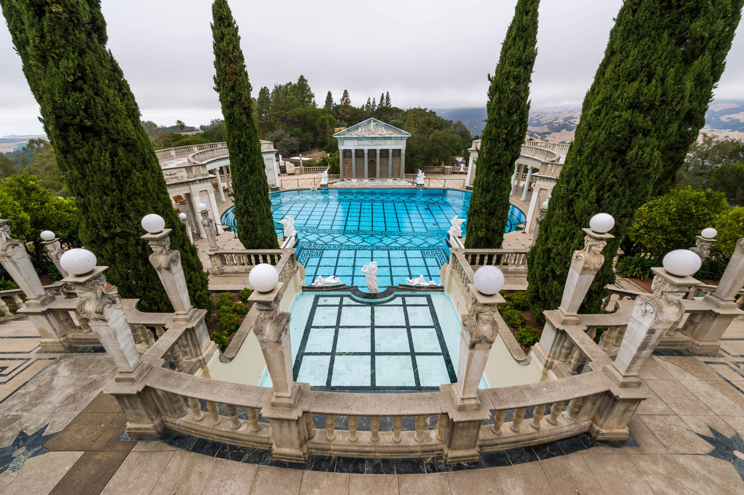 Pool mosaics, intricate tile designs and patterns installed on the pool's interior surface, creating visually appealing and decorative elements that enhance the pool's aesthetics.