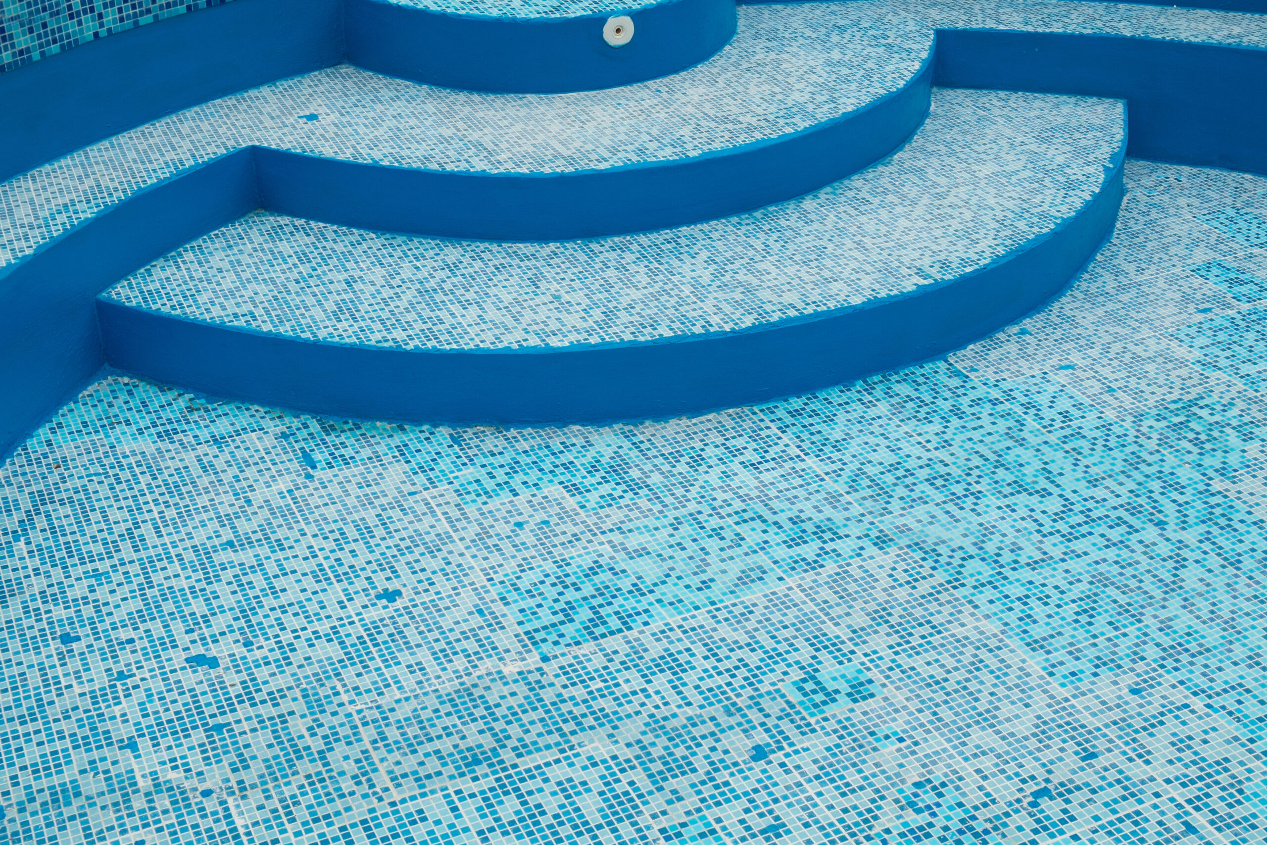 Various tile colors used in pool design, showcasing a diverse and visually appealing palette that adds depth and personality to the pool's aesthetic