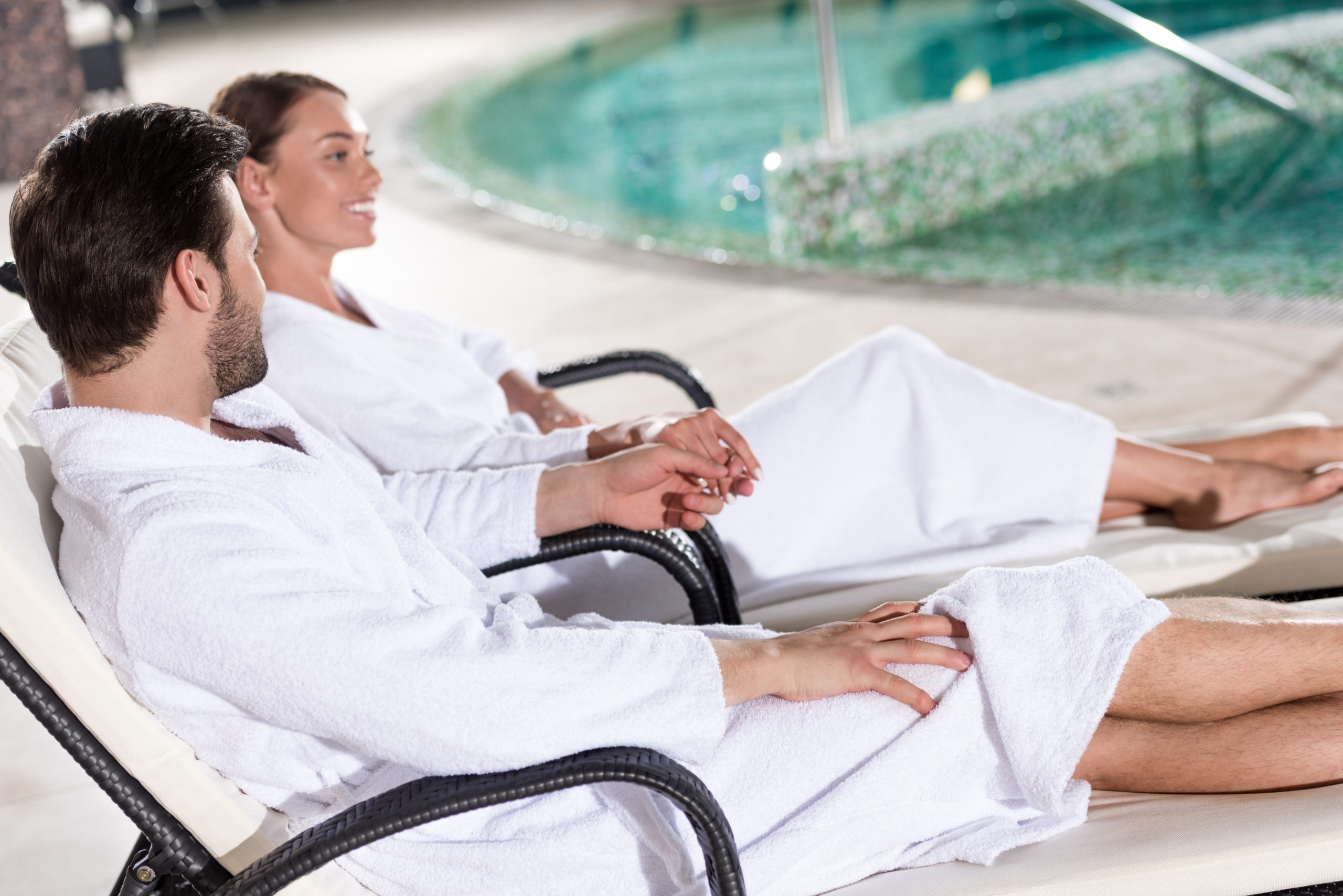 A couple indulging in a spa pool