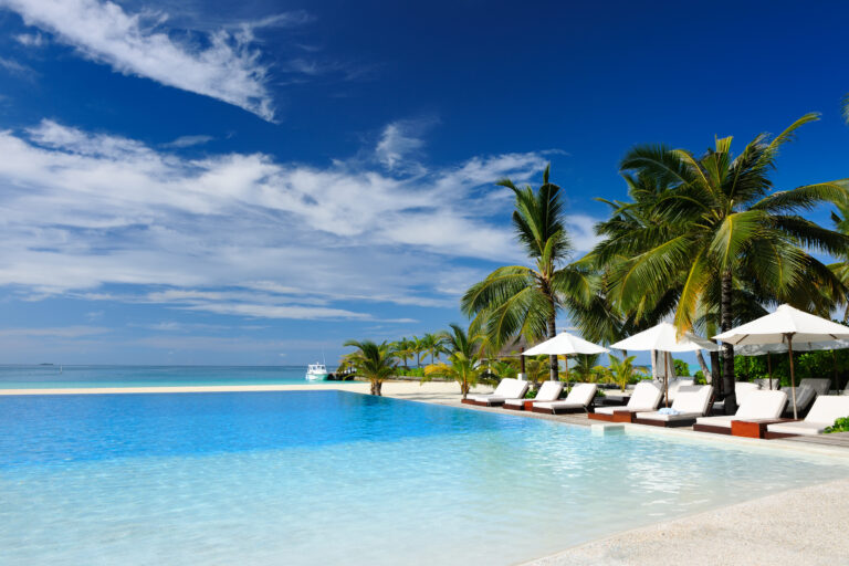 Beach Entry Pools Merging the Shore with Your Backyard