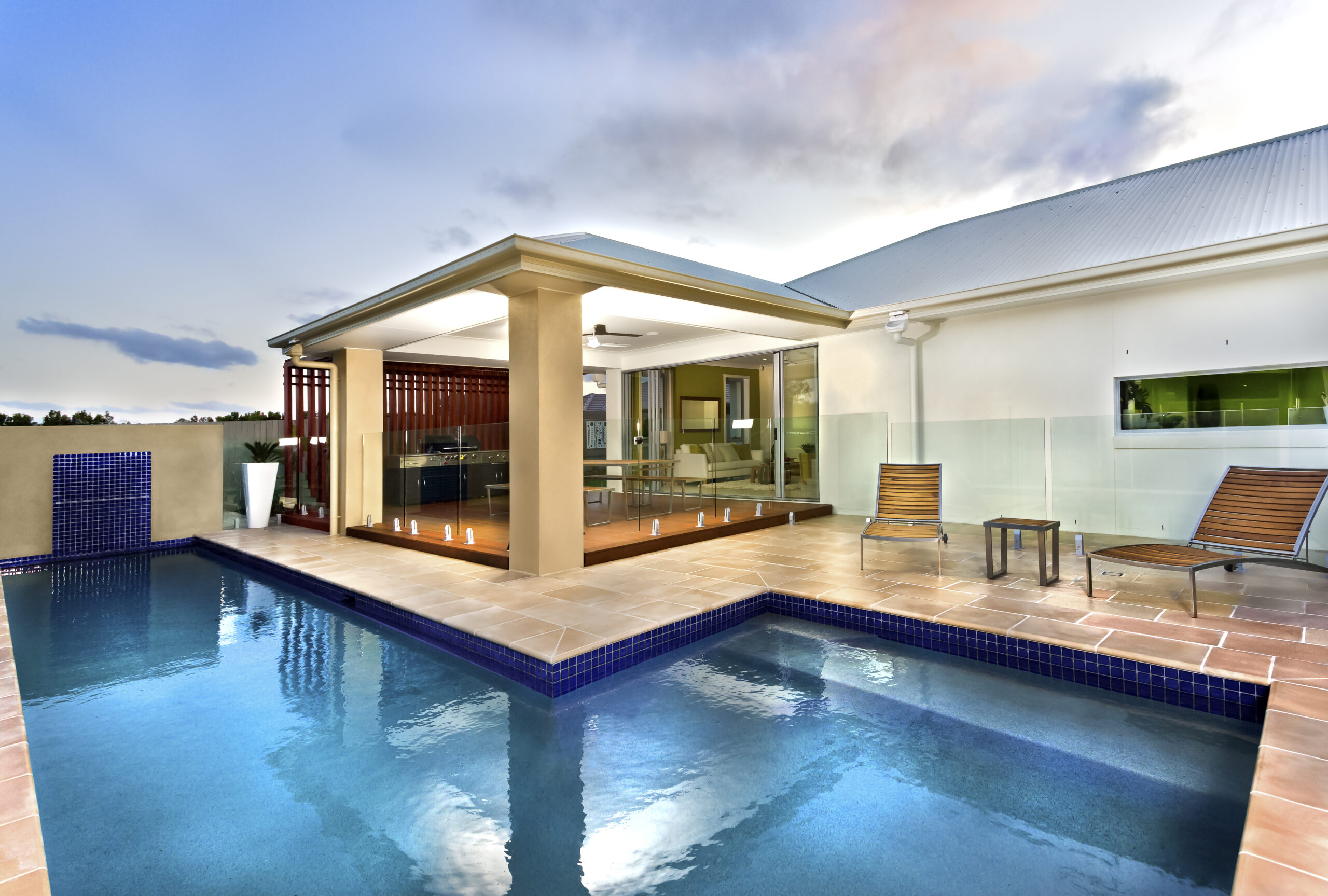 L-shaped pool designs, characterized by their unique and angular shape, offering versatility and distinctiveness in swimming pool aesthetics and functionality.