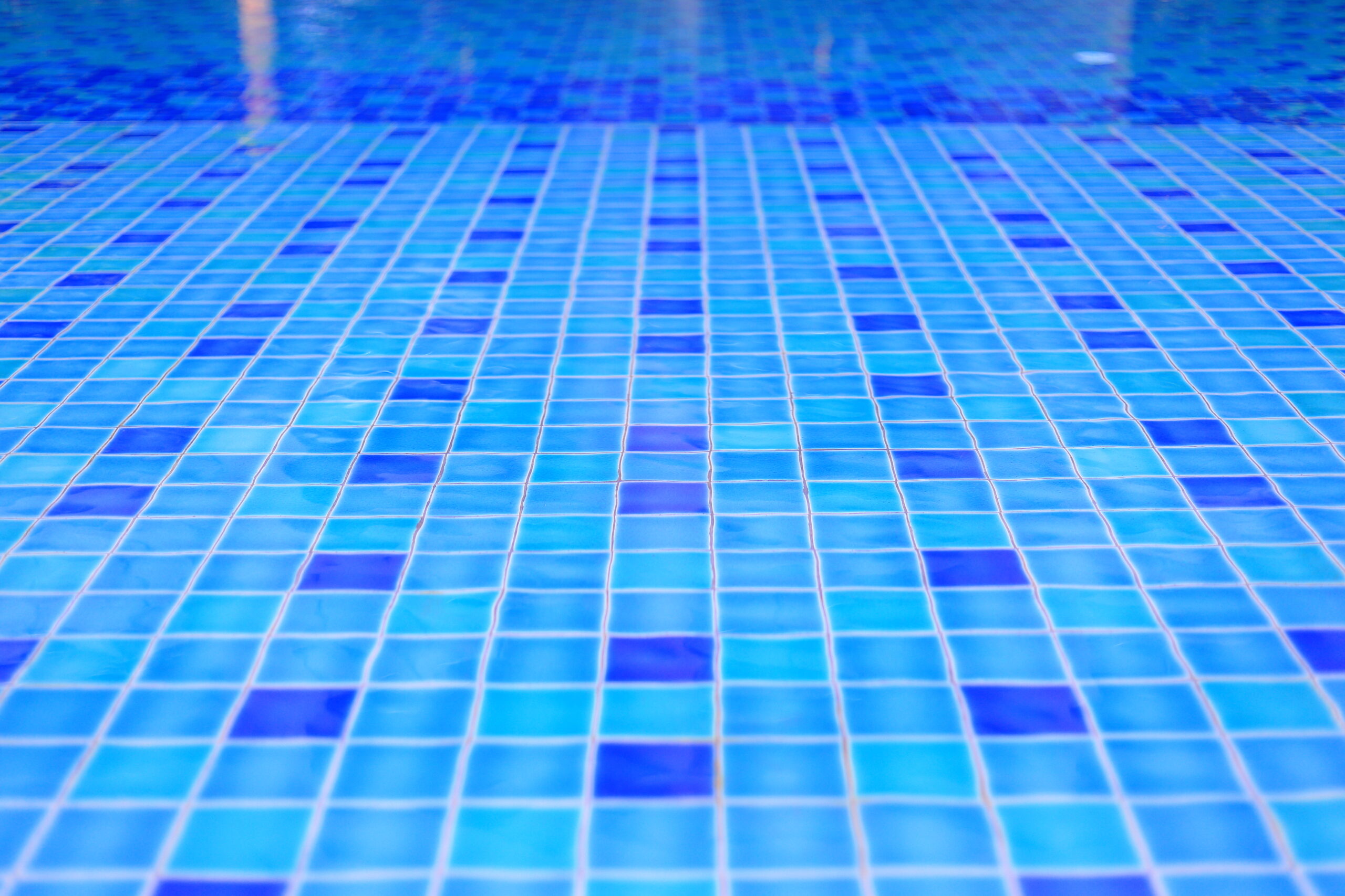 Ceramic tiles, a popular choice for pool surfaces, known for their durability and aesthetic appeal, creating a clean and visually pleasing finish for pool interiors and exteriors.