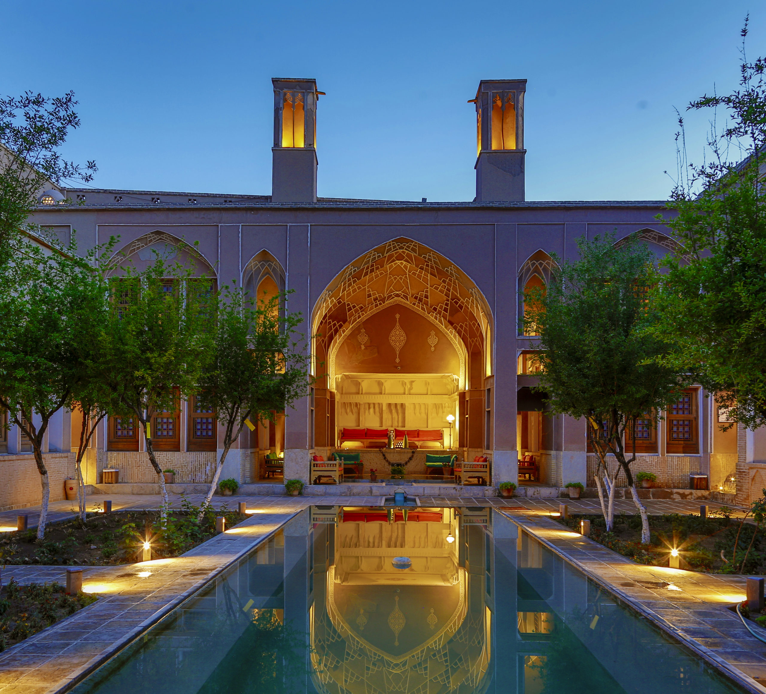 A Renaissance-style pool with ornate architectural elements