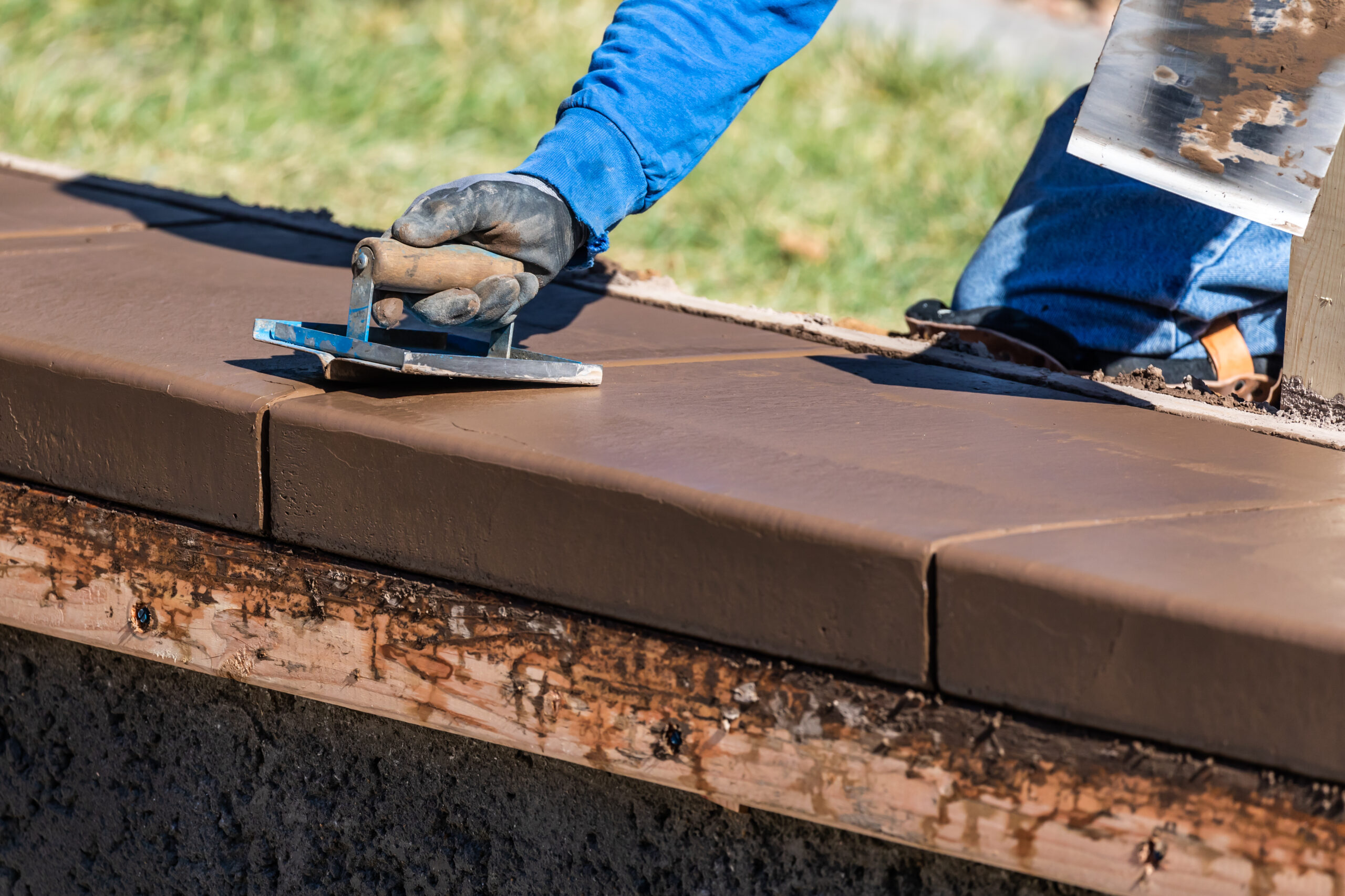 Installing a pool deck, featuring the construction process 