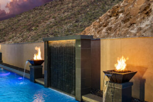High-End Custom Swimming Pool with Waterwall Feature and Dual Water and Fire Bowls