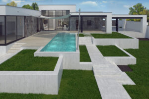A sloped backyard featuring an inground pool nestled into the landscape
