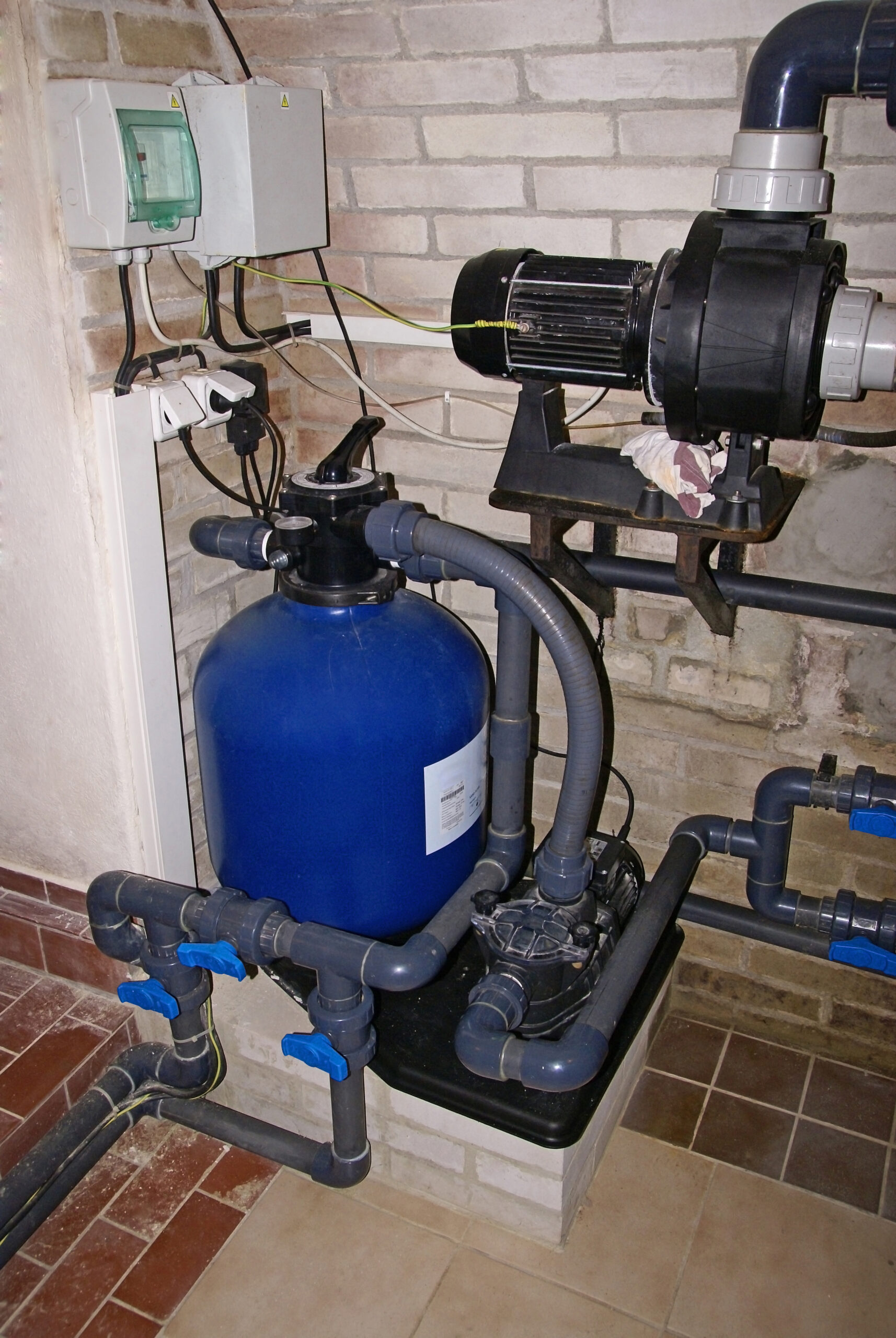 Pool machine equipment, including pumps, filters, and other machinery used for pool maintenance and water circulation.