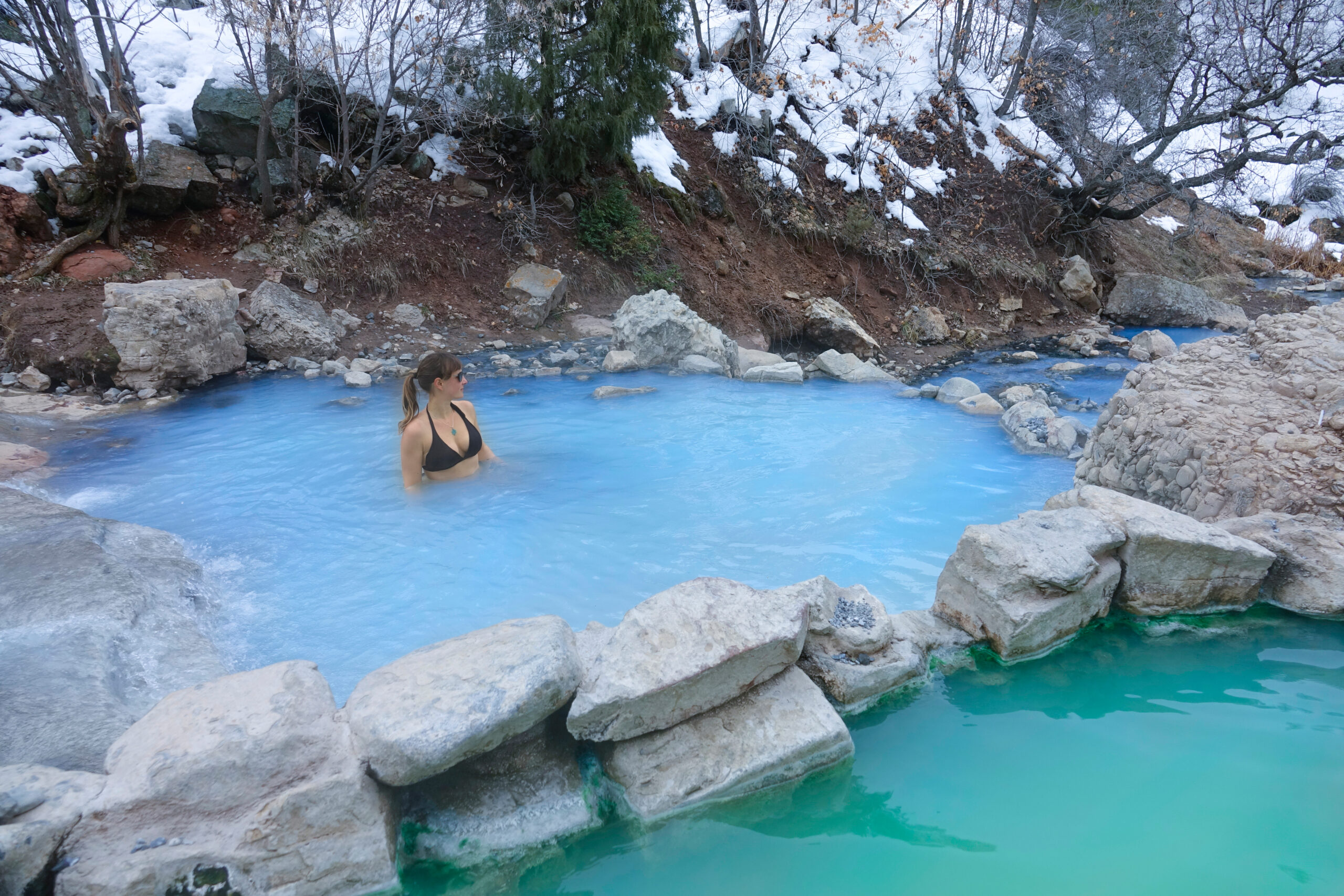 A woman in a natural pool, possibly for injury prevention measures