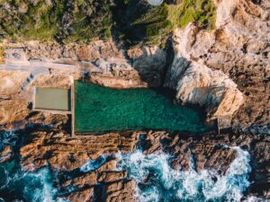 An above shot of a natural pool, designed to blend seamlessly with the surrounding environment