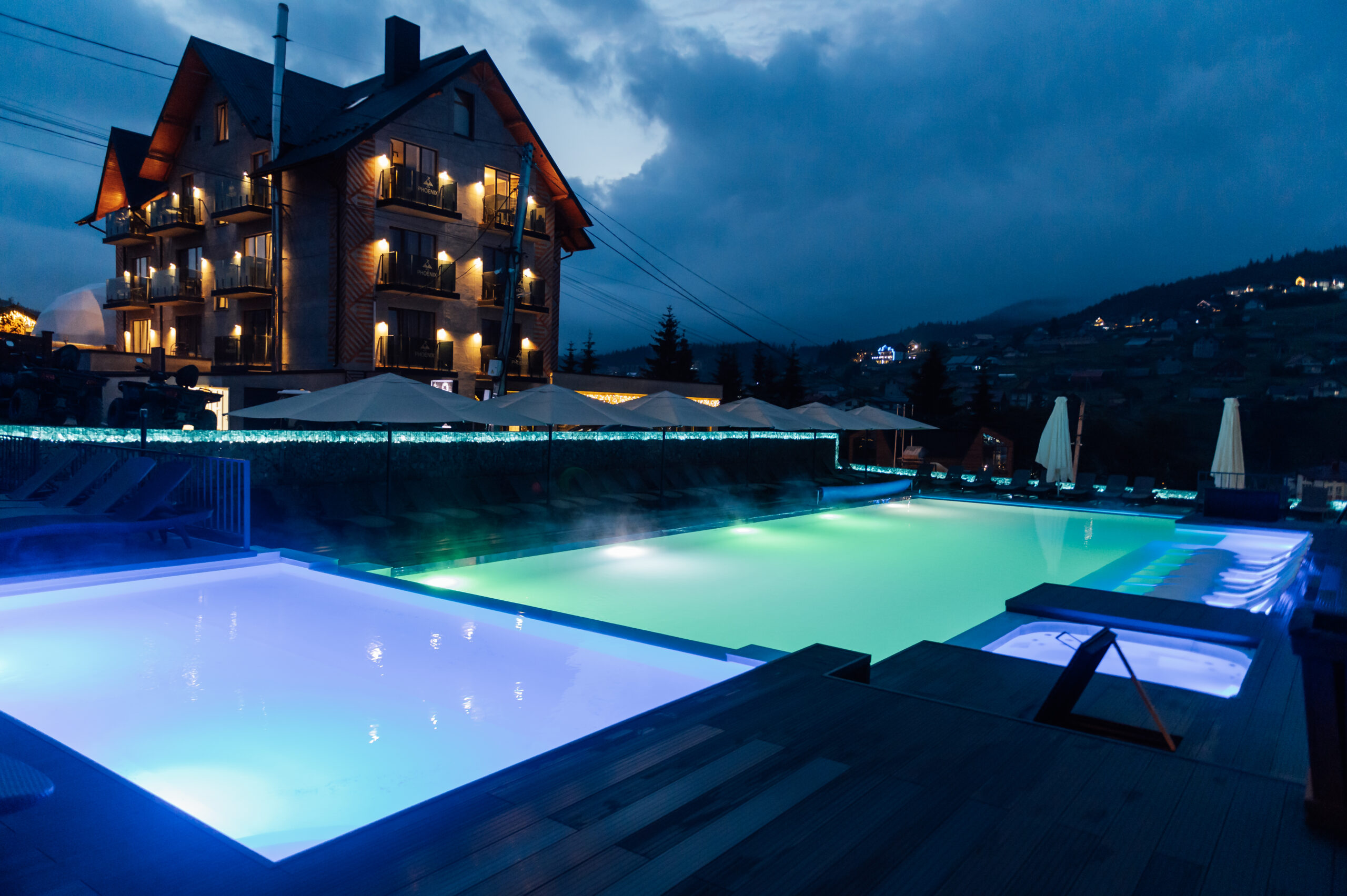 LED underwater lighting illuminating the pool's depths, creating a mesmerizing and colorful aquatic ambiance.