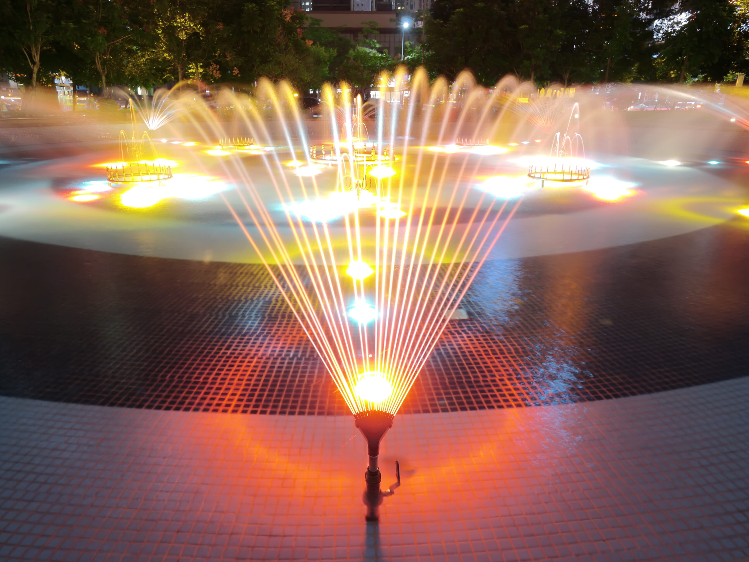 LED pool lighting and fountains in action, creating a visually dynamic and captivating aquatic display with colorful lights and synchronized water features.