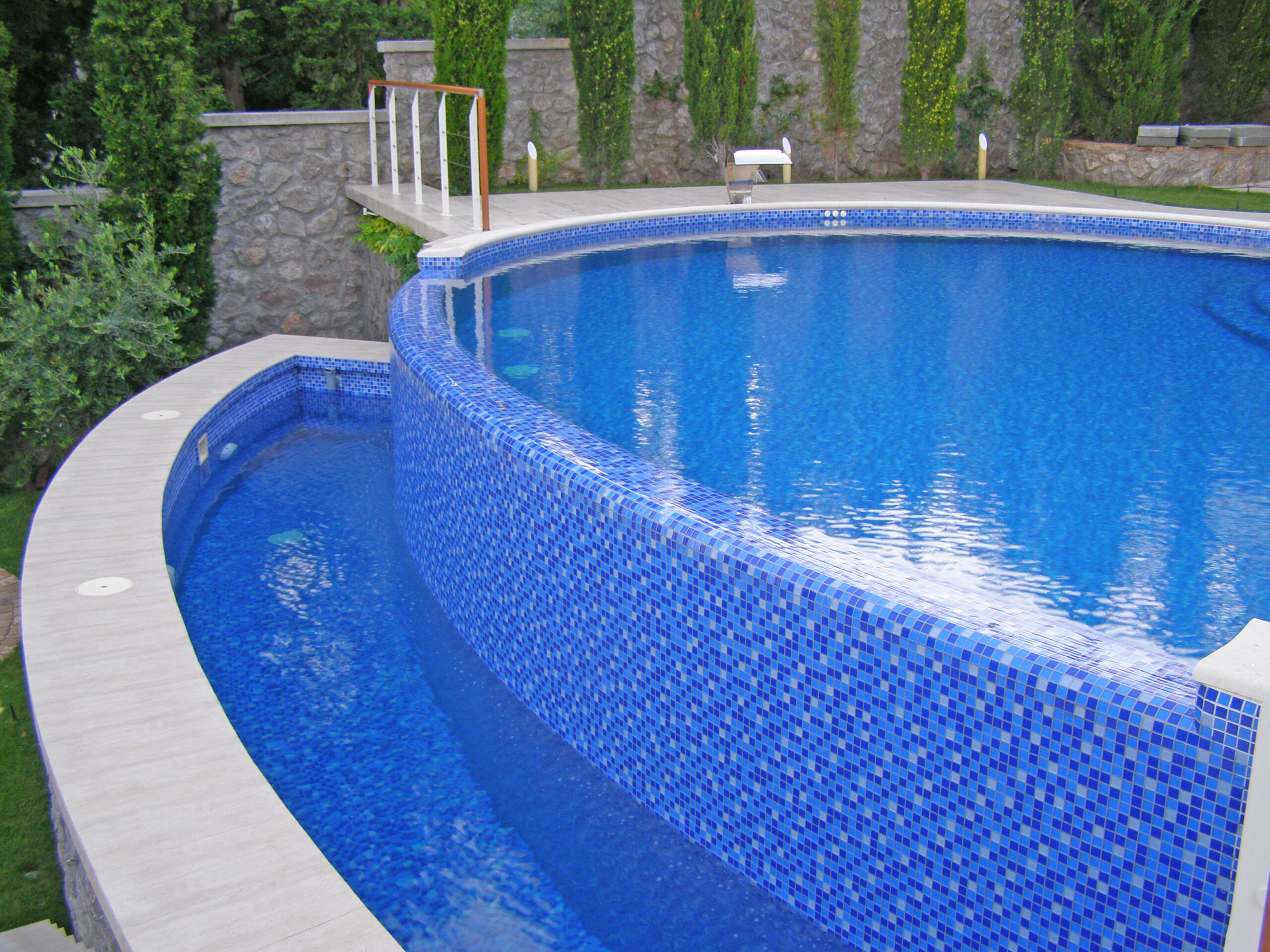 Pool coping, the protective and decorative edging material that surrounds the top perimeter of a swimming pool